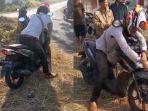 viral-pria-telungkup-di-atas-motor-gegerkan-warga.jpg
