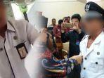 viral-video-lurah-timbangan-lakukan-dugaan-pungli-rp50-ribu-bupati-ogan-ilir-langsung-copot-jabatan.jpg
