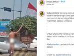 viral-video-pria-berpopok-kibarkan-bendera-merah-putih.jpg