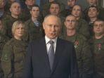 vladimir-putin-menyampaikan-pidato-tahun-baru-2023-di-rusia.jpg