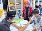 wakaf-quran-braille.jpg