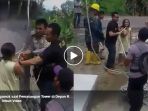 wanita-nias-ngamuk-saat-pemasangan-tower-di-depan-rumah-rebut-tali-lalu-diikatkan-ke-leher_20180505_141239.jpg