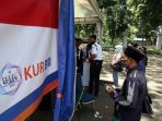 warga-antre-penyaluran-kur-di-bogor_20201202_205506.jpg