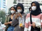 warga-beraktivitas-menggunakan-masker.jpg