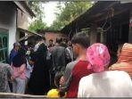 warga-berkumpul-di-depan-kontrakan-ef-pemuda-23-tahun-yang-tewas-cara-tak-wajar.jpg