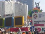 warga-berpose-dengan-latar-countdown-asian-games-2018_20180902_135026.jpg