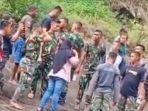 warga-dan-tni-cari-anggota-tni-yang-dikabarkan-hilang.jpg