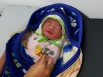 warga-desa-megamendung-dibuat-geger-dengan-penemuan-bayi_20170908_124845.jpg