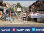 warga-desa-watudakon-kesamben-jombang-memblokade-jalan_20160831_115445.jpg