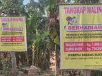 warga-di-nganjuk-memasang-spanduk-sayembara-tangkap-maling.jpg