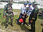 warga-dipukuli-tni-au_20160815_113701.jpg