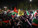 warga-iran-rayakan-serangan-balasan-garda-revolusi-ke-israel_20240415_095248.jpg