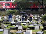 warga-jakarta-ziarah-kubur-jelang-ramadhan-1443-hijriah_20220327_164223.jpg