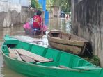 warga-jambi-berperahu_20170314_072428.jpg