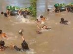 warga-jambi-terpaksa-angkut-jenazah-sambil-berenang.jpg