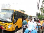 warga-kalijodo-pindah-ke-rusun-marunda-gunakan-bus-sekolah_20160224_163013.jpg