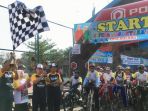warga-kota-malang-antusias-ikuti-sepeda-nusantara-etape-malang_20181016_194606.jpg