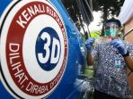 warga-memperlihatkan-uang-kertas-baru-pecahan-rp-75000_20200818_145036.jpg