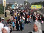 warga-palestina-berjalan-dari-gaza-utara-ke-bagian-selatan.jpg