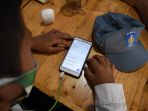 warkop-pitulikur-fasilitasi-siswa-belajar-daring-dengan-wifi-gra_20200720_171520.jpg