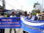 wartawan-indonesia-pwi-kota-tegal-menggelar-aksi-bertepatan-dengan-h_20180209_183001.jpg