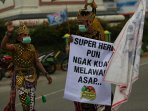 wayang-prihatin-bencana-kabut-asap_20151006_155902.jpg