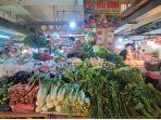 widi-pedagang-sayur-mayur-di-pasar-cipanas.jpg