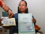 wna-malaysia-palsukan-dokumen-keimigrasian_20151024_205242.jpg