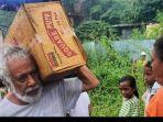 xanana-gusmao-saat-turun-langsung-membantu-korban-banjir-dan-tanah-longsor-di-dili.jpg