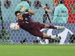 yassine-bounou-selamatkan-gawang-maroko-menuju-8-besar_20221207_012157.jpg