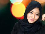 yovieka-rini-dari-dunia-fotografi-terjun-ke-dunia-tarik-suara.jpg