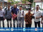 za-17-seusai-menjalani-sidang-perdana-kasus-pembunuhan-begal-di-kabupaten-malang.jpg