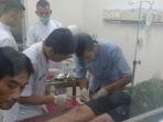 zainuddin-saat-mendapatkan-penanganan-medis-di-rs-bhayangkara-jalan.jpg