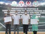 zainudin-amali-bersama-ketua-koni-pusat-marciano-norman.jpg
