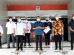 zainudin-amali-saat-menjelaskan-hasil-rapat-koordinasi-ibl.jpg