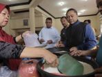 zulkifli-hasan-melakukan-sidak-ke-pedagang-beras-di-pasar-gede-minggu-pagi-1412018_20180114_131744.jpg