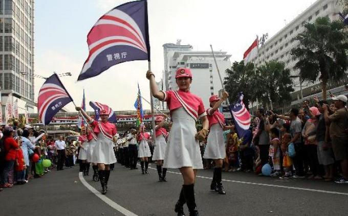FOTO: Polwan-polwan Cantik dari Jepang Melenggang Centil di Jalanan Jakarta  - 244236p.JPG