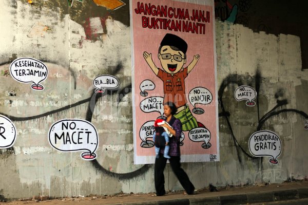 Mural Tagih Janji Cagub Cawagub DKI