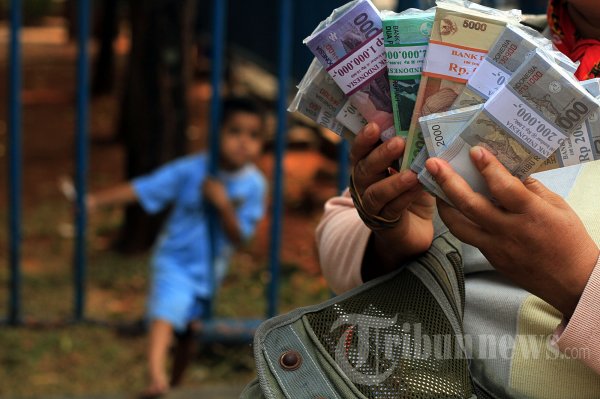 Jasa Penukaran Uang Jelang Lebaran