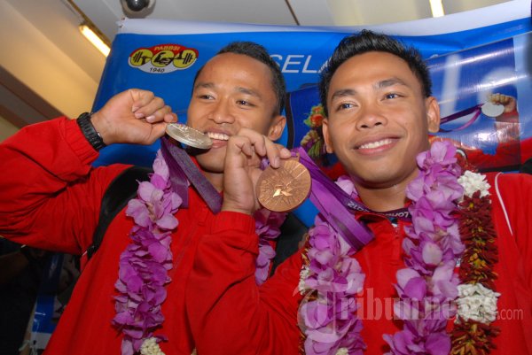 Triyatno dan Eko Yuli Irawan