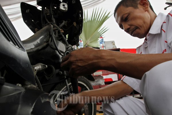 Service Motor Gratis Korban Banjir