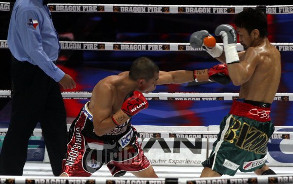 Pertandingan Chris John Dihentikan