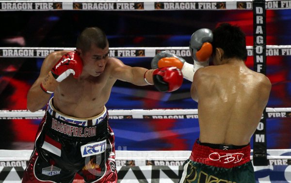Pertandingan Chris John Dihentikan