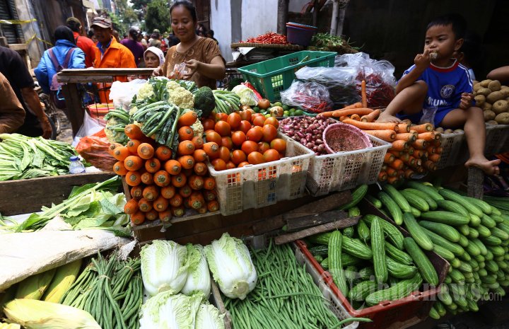 Pedagang Sayuran di Pasar Teluk Gong