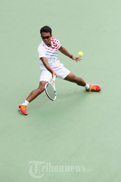 Aksi Althaf Dhaifullah di Laga Tenis Piala Davis