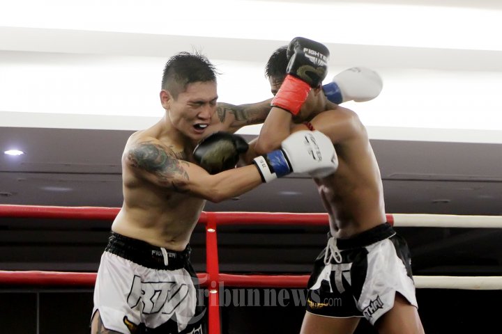 James dan Hamam Saling Pukul di Kejuaraan Muay Thai
