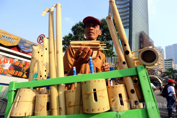 Penjual Permainan Anak Tradisional
