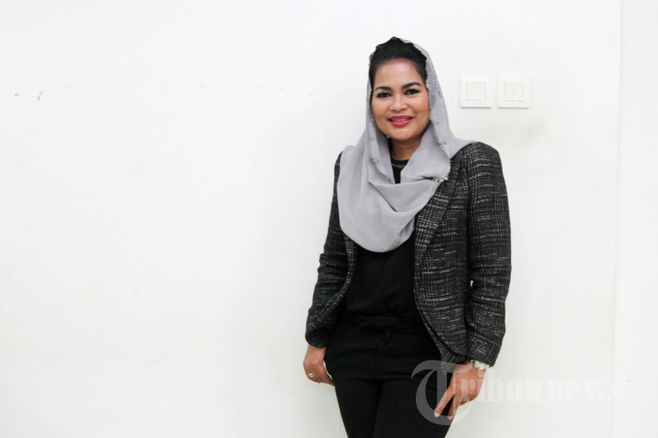 Puti Mendatangi Kantor Tribun