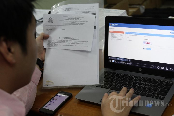 Wajib Pajak Laporkan SPT Tahunan