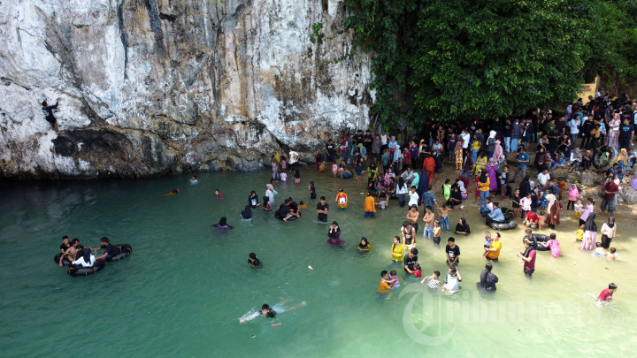 Wisata Tamborasi Sungai Terpendek di Dunia saat Liburan Lebaran